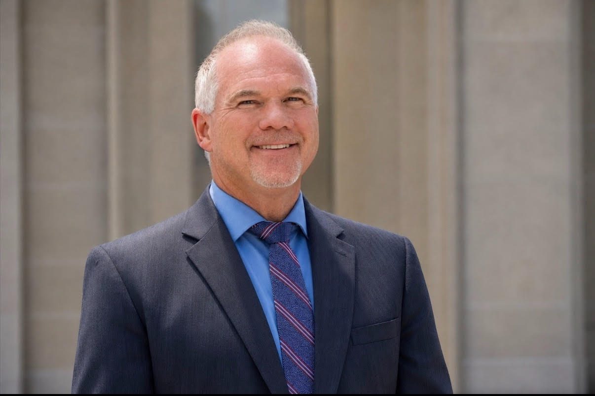 Lawyer smiling for a headshot